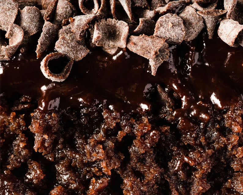 closeup dessert photography of a gluten free chocolate cake